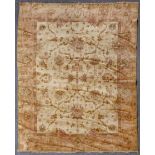 An Indian Indo Oushak rug, fourth quarter 20th century, the pale buff field with stylised floral and