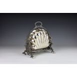 A Victorian silver plated clam shell muffin warmer, by Walker & Hall, Sheffield, on branch supports,