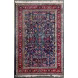 An Isfahan rug, second half 20th century, the dark blue ground with all over arabesque patterns