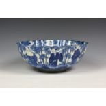 A Japanese blue and white scalloped edge punch bowl, probably early 20th century, with continuous