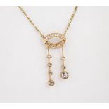A 15ct yellow gold and diamond necklace, stud earring and ring suite., all three pieces are inset