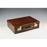 A fine quality leather attache case by Papworth of Cambridge, with brass fitments and dark green