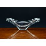 A Daum France clear glass double candle holder float boat centrepiece, the free flowing, clear glass