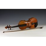 A 19th century violin, the inside of the body labelled 'Carlo Antonio Testore figlio Maggiore del fu