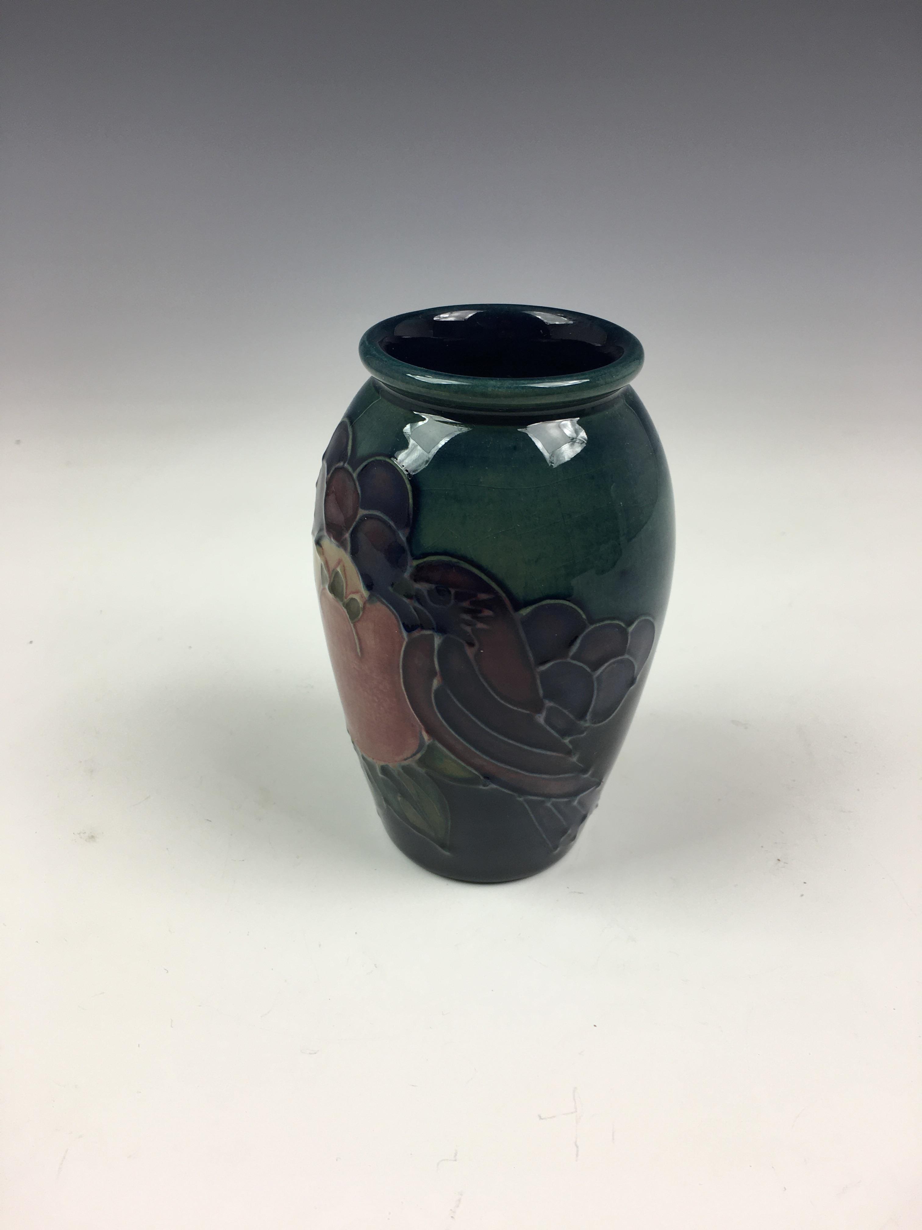 A modern Moorcroft 'Birds and Fruit' vase, the small ovoid vase decorated with birds and fruit on - Image 2 of 7