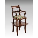 A William IV mahogany metamorphic child's high chair, the chair with foliate and rosette carved back