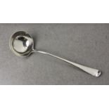 A George III silver Hanoverian pattern soup ladle, maker's mark and date letter indistinct,