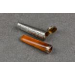 A 9ct rose gold and amber cheroot holder with silver case, Cornelius Desormeaux Saunders & James