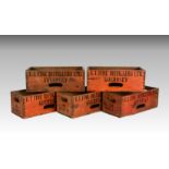 A collection of five orange stained wooden distillery advertising storage crates - Channel Island