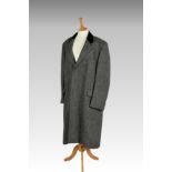 A men's grey Aquascutum pure lambswool coat, in a herringbone pattern with black velvet collar;
