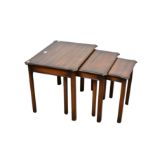 A nest of three mahogany occasional tables, 1920s