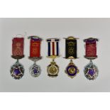 Five enamel silver and silver gilt Guernsey related RAOB jewels four relating to Sarnia Lodge
