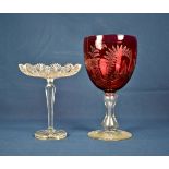 A Victorian oversized goblet form cranberry and clear glass vase the ovoid cranberry bowl with