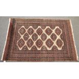 A Tekke Bokhara style rug 47¾ x 70¾ in (121.2 x 179.7cm)