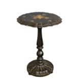 A Victorian papier-mache and mother-of-pearl tilt-top table the scalloped top on a baluster