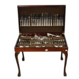 A mahogany and leather table canteen of Sheffield silver-plated Kings pattern cutlery for twelve