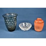 A Whitefriars glass vase with dipple effect in pewter, together with a orange art glass vase,