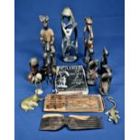 A small collection of African carved figures etc together with brass ornaments. (qty)