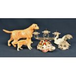 A Royal Crown Derby tortoise paperweight together with a Lladro 1599 crane; a Royal Doulton Golden