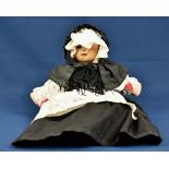 A Guernsey Cobo Alice doll.