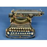 An early 1920s Smith Corona folding typewriter