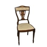 An Edwardian mahogany and rosewood bedroom chair with inlaid marquetry back