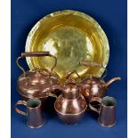 A Guernsey copper can, two copper kettles and two small copper tankards together with a brass bachin