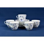 A set of six Royal Copenhagen cups and saucers painted in underglaze blue in 'Onion' pattern,