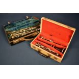 A vintage F. Buisson clarinet and a Console clarinet -both cased. (2)