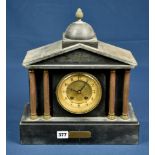 An Edwardian slate clock of architectural form.
