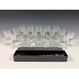 A set of four Waterford cut crystal Clare pattern port glasses together with a boxed Waterford