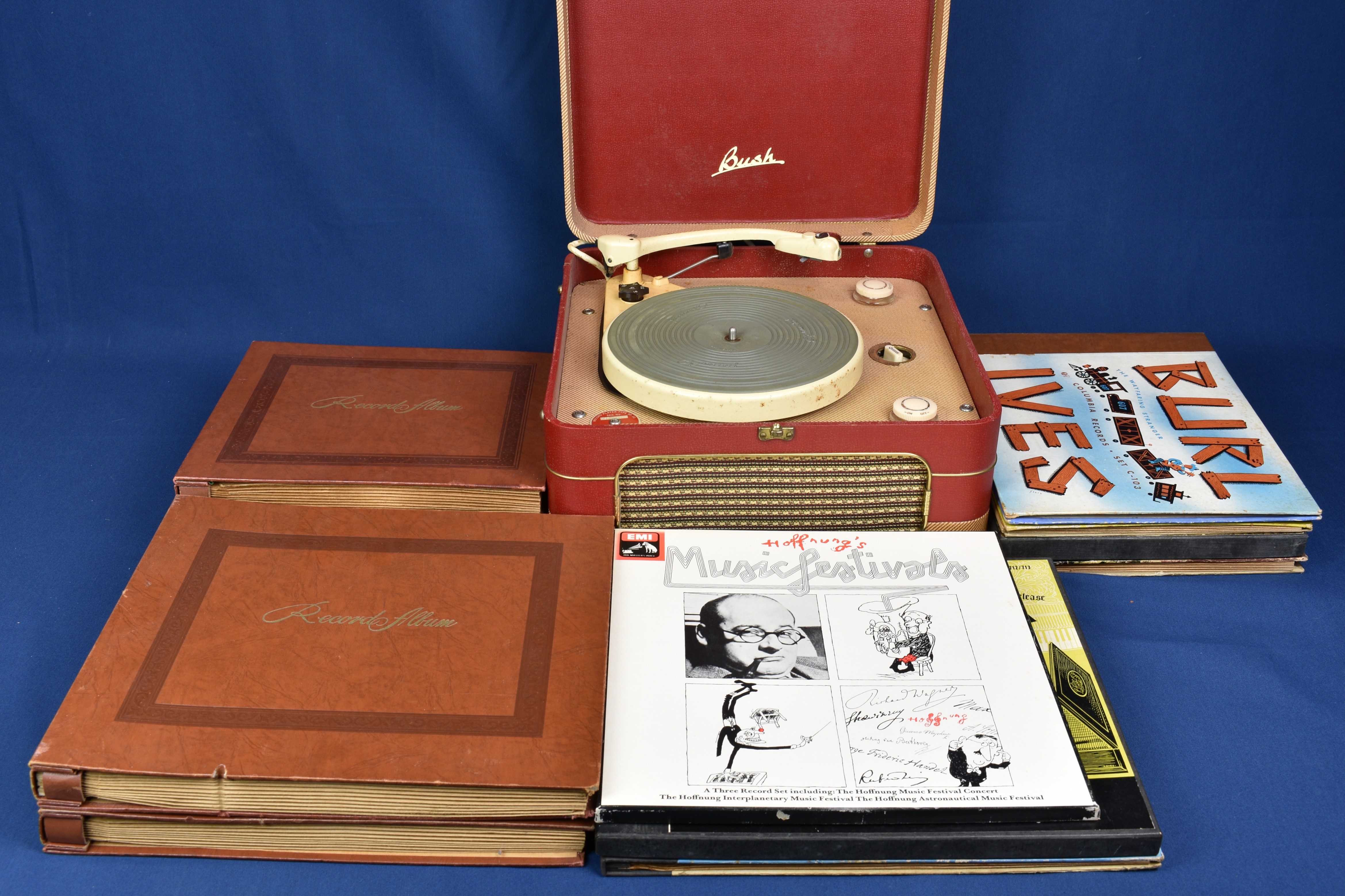 A 1960s Bush RP.20 portable record player with Garrard tonearm and turntable, together with a