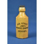 An Ann Street Brewery Company Jersey stoneware ginger beer bottle.