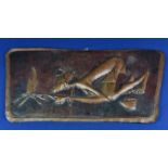 A vintage hand beaten African plaque of tapering rectangular form depicting a tribal man starting