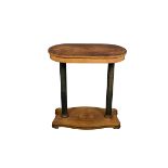 A Continental sycamore and ebonised centre table late 19th century, the rounded oblong top