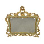 An 18th century style gilt and painted mirror with pierced frame