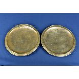 A pair of Japanese bronze footed dishes early 20th century, with engraved decoration of birds on