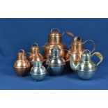 Four graduated Guernsey copper cans plus a silver plated can, teapot and milk jug (7)