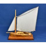 A mid century wooden sailing boat table lamp.