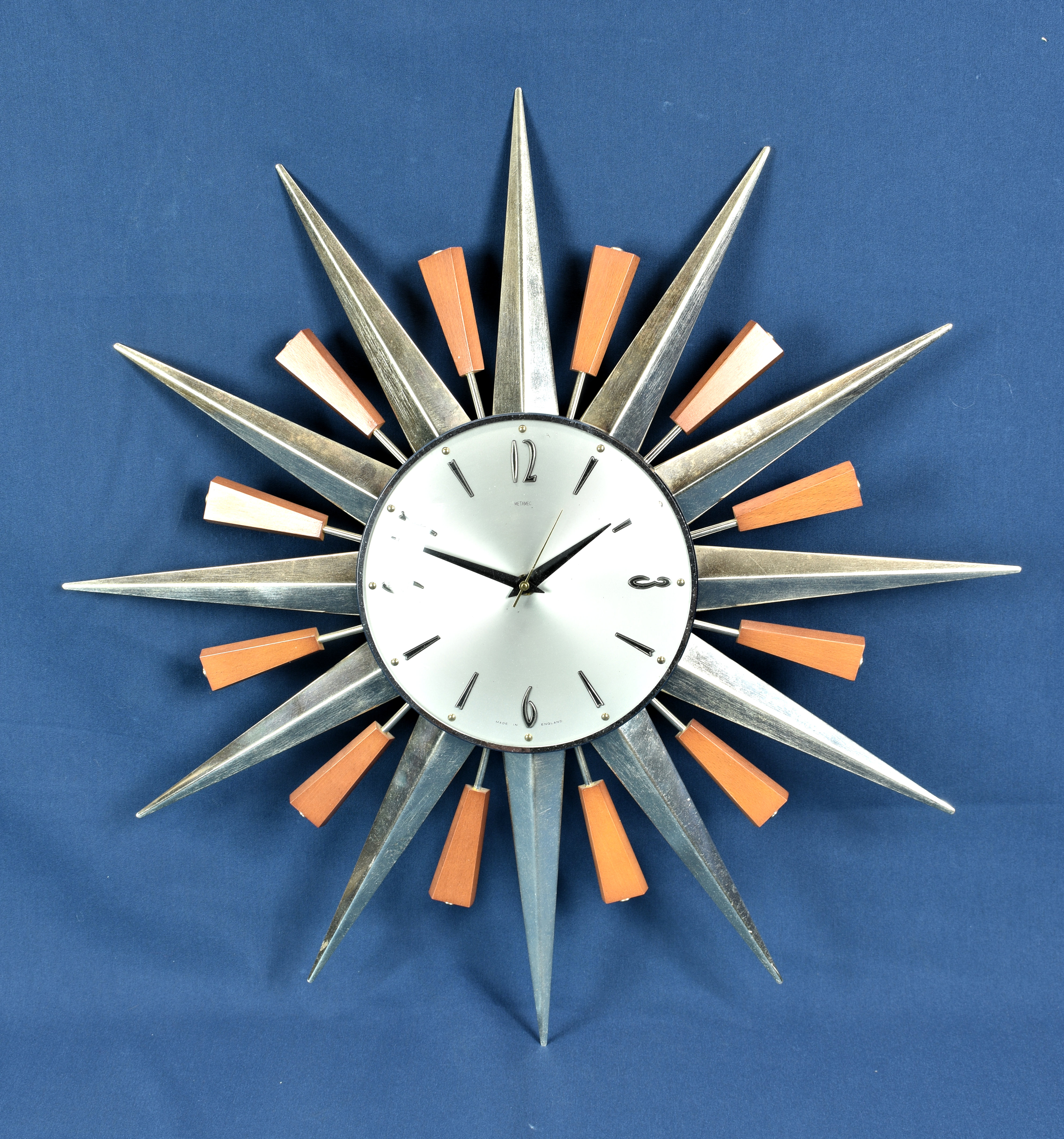 A retro 1970s Metamec quartz Sunburst wall clock