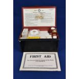 A Second World War period First Aid Kit by Boots The Chemist to include dressings, Sal Volatile