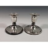 A pair of Elizabeth II silver dwarf candlesticks, Birm. 1954. (2)