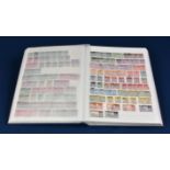 A stockbook of Great Britain and Commonwealth stamps Queen Victoria onwards, large quantity.