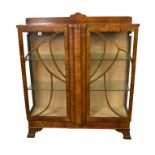 An Art Deco walnut display cabinet (one pane of glazing a/f)