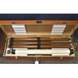 A Tassco 60mm. refractor telescope and wooden tripod in original case reg. no. 57500, VG cdn.