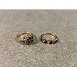A 9ct gold, ruby and diamond cluster ring; together with a 9ct gold, ruby & CZ ring. (2)