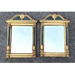 A pair of modern Louis XV style wall mirrors with gilt and painted frames and bevelled plates, 24¼ x