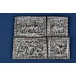 A set of four silvered copper plaques of square and rectangular form, probably insets from a box,