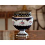 A Crescent China rose bowl, 1920s, decorated with flower garlands and sprays on cobalt blue