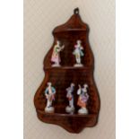 A 19th century kingwood and cube parquetry hanging corner shelf, of shaped form, the serpentine